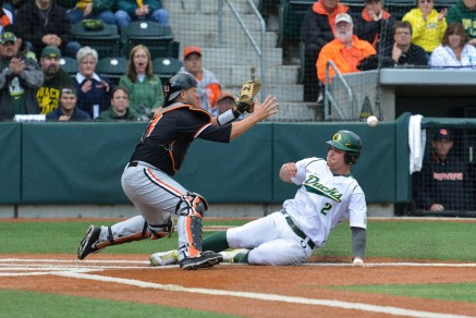 Runs were tough to come by in the Civil War series as Brett Thomas scores on a close play at the plate.