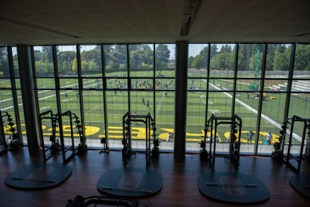 Weight training room in FPC overlooks practice fields