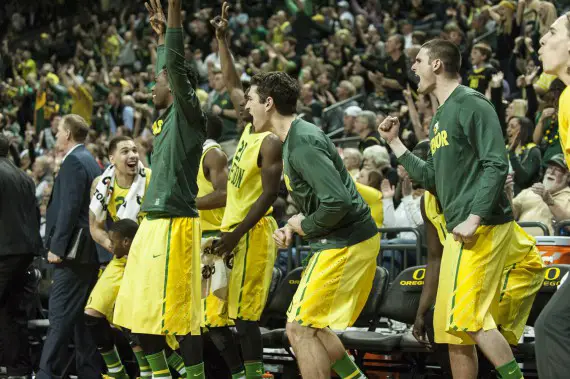 The Oregon bench celebrates during a win over Arizona