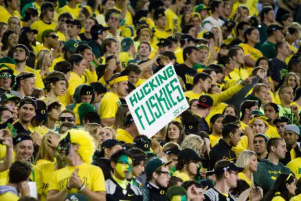 A Oregon fan shows their "love" for the Huskies