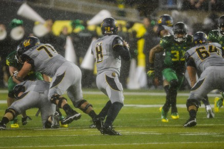 Cal players in the waterfall of the Oregon-Cal game