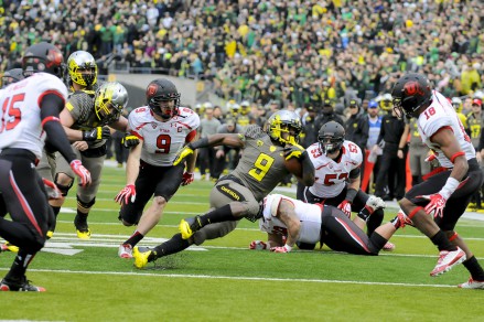 Byron Marshall trying to escape from the Utes in the 2013 game. 