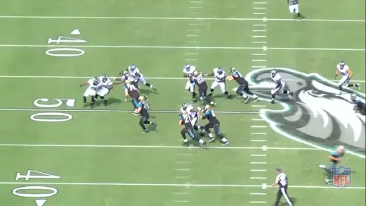 Cox sheds the block and leaves Gerhart with no room to run.