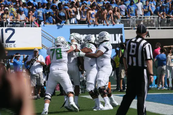 Ducks celebrate one of their many scores against UCLA