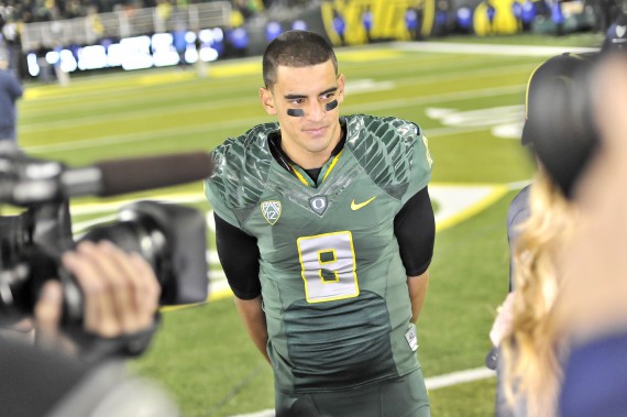 Marcus Mariota in front of the media.