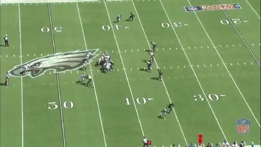 Boykin jukes and sprints to the right of the Jaguars player.