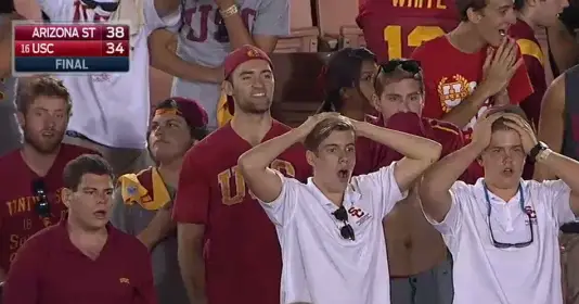 USC fans were stunned after Arizona State scored on a last second hail mary to win 38-34.