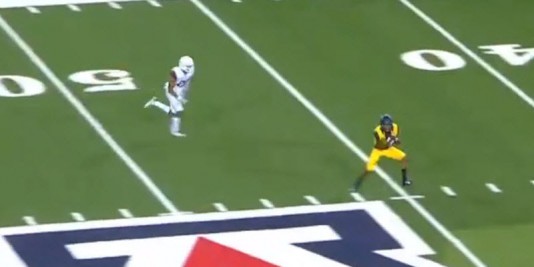 The receiver beats his man and it's and easy pitch and catch for Cal