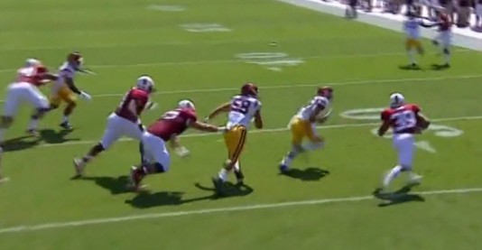 The running back beats USC to the edge and turns it upfield