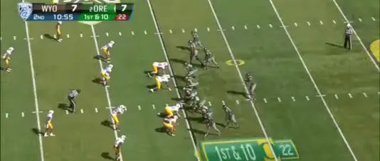 Helfrich adds a wrinkle to the Sweep Read by putting a slot receiver in motion for an exchange with the quarterback.