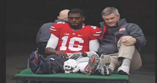 JT Barrett leaving Michigan game with broken ankle