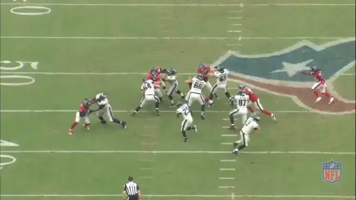 Kelce gets his hands on the linebacker to gain leverage against him.
