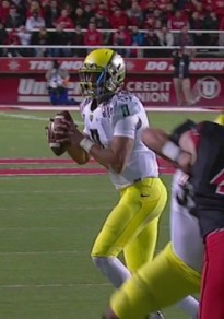 Marcus Mariota about to pass for a TD.