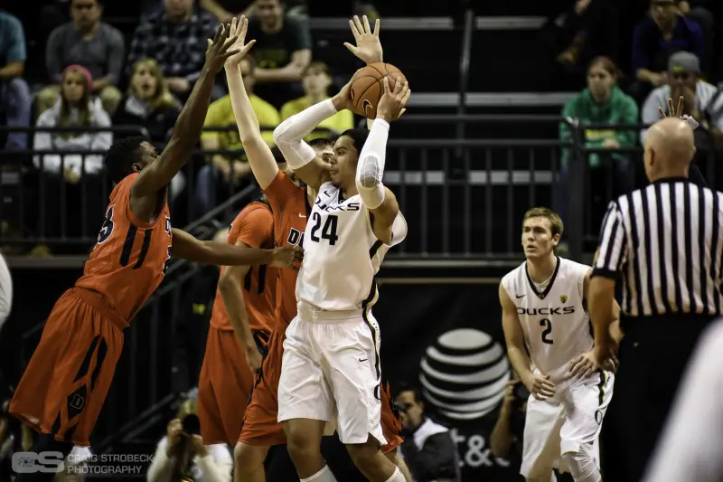 Dillon Brooks looking to get rid of the ball. Photo: Craig Strobeck