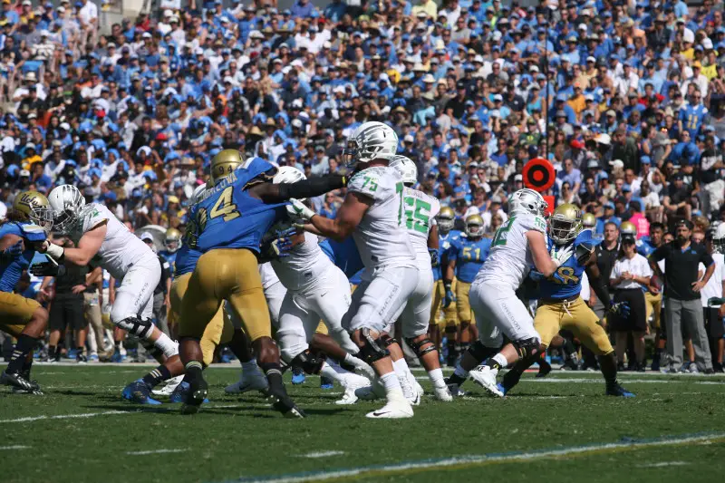 Oregon offensive line opening up some holes against UCLA. Photo: David Pyles