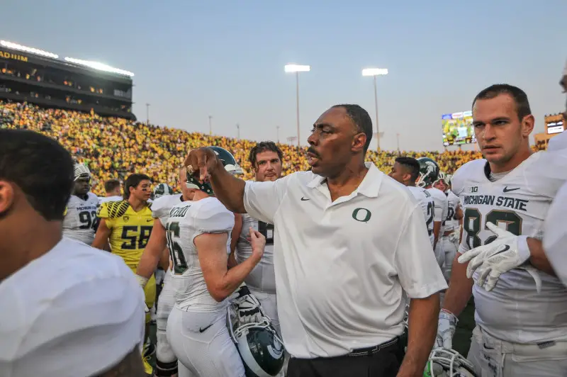 Ducks defensive coordinator Don Pellum after helping lead his team to victory against Michigan State. Photo: Kevin Cline