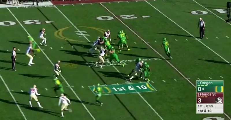 The TE gets a free release off the line and finds a wide open area in the deep right side of the field.
