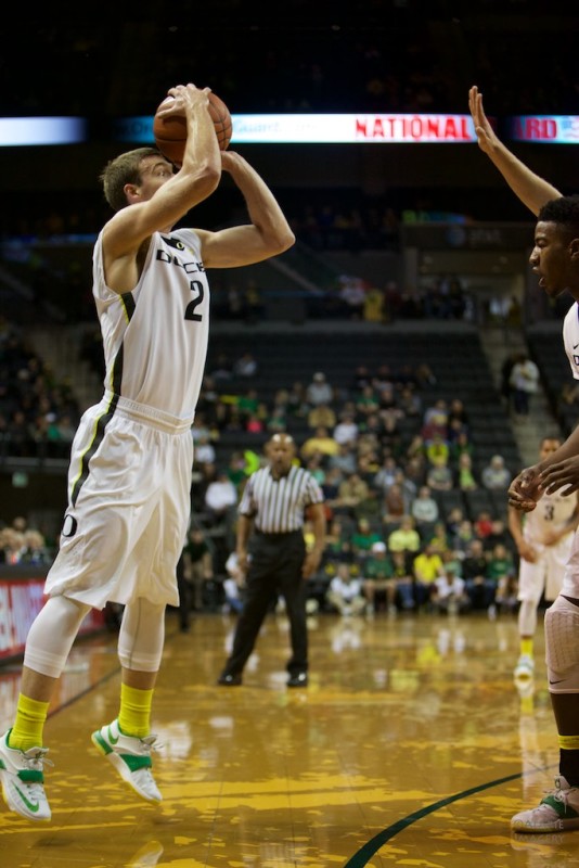 Oregon Guard Casey Benson attempting a three pointer against ASU. Photo by: Donald Alarie