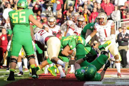 Thomas Tyner scores one of his two touchdowns as the Ducks set Rose Bowl scoring record against Florida State.