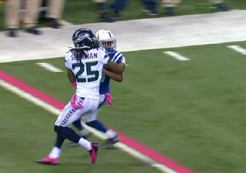 Richard Sherman reliving his days in Compton by mugging an unsuspecting wide receiver.
