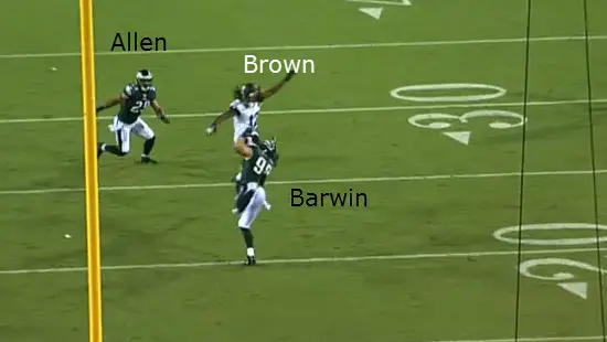 Barwin tips the ball in the air.