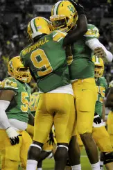 Byron Marshall celebrates in a game against the UW Huskies.