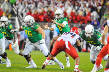 Thanks to solid blocking from Fisher and Co., the Ducks ran rough shod over the Wildcats in the Pac-12 Championship game.