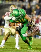 Thomas Tyner Runs Through Two Florida State Defenders In The Rose Bowl
