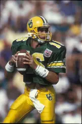 Danny O'Neil throws a pass against Washington in 1994