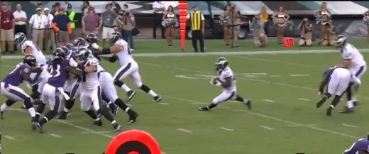 Sam Bradford takes a hit in the knees from Terrell Suggs during week 2 of the NFL Preseason