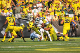 The Ducks will have to emulate this strong tackling in order to stop the Spartans.
