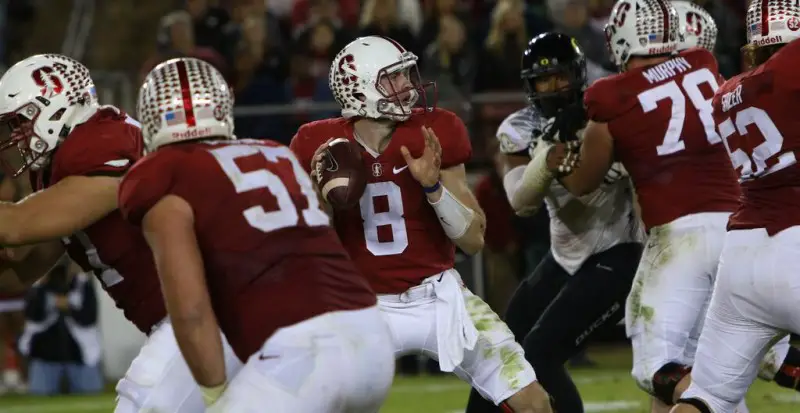 Stanford's Kevin Hogan, captured here in a rare moment of holding onto the ball.