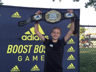 Apparently wrestling isn't the only sport in which belts can be won. Murphy celebrates after runner her 4:07 1500m race at the Boston Games. 