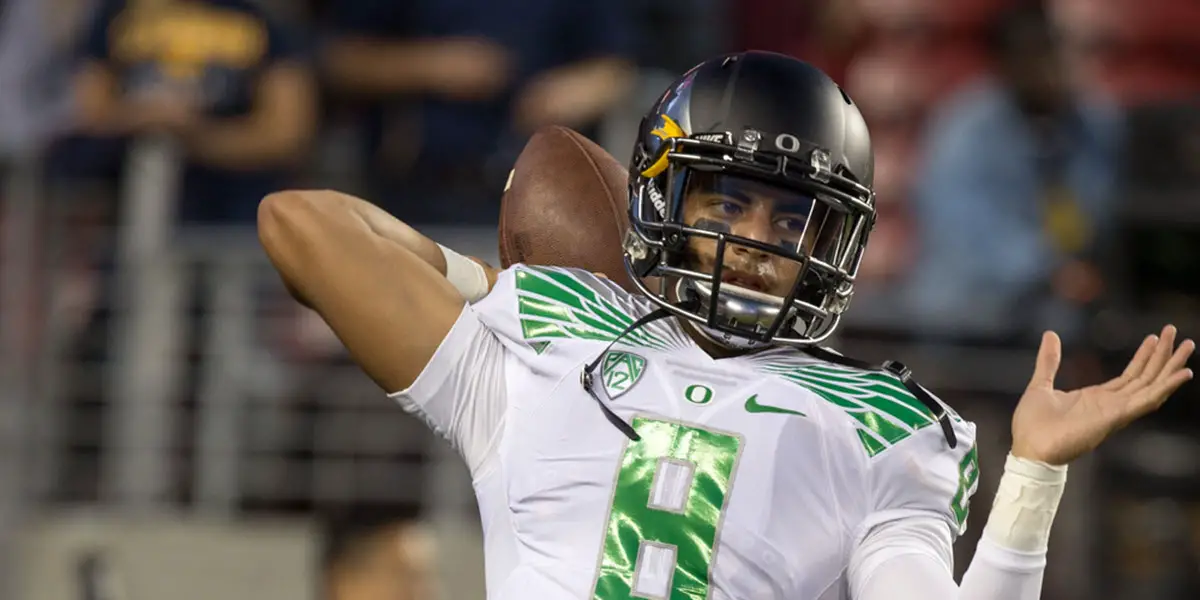 Photos: Herbert and Mariota — A battle of former Ducks