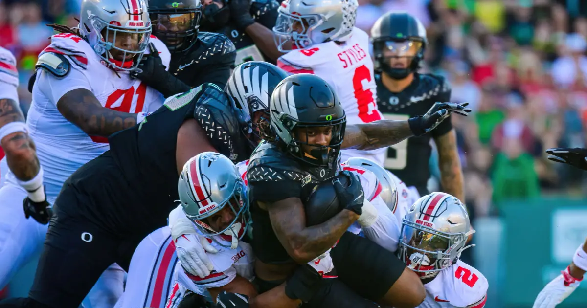 Oregon football - Oregon vs Ohio State -Jordan James runs the ball - FishDuck.com in Eugene, OR