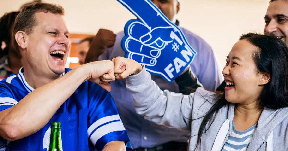 Excited-sports-fans-fist-bumping-while-watching-a-game_Photo-from-Freepik.jpg
